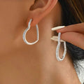 Arete de corazón con circones